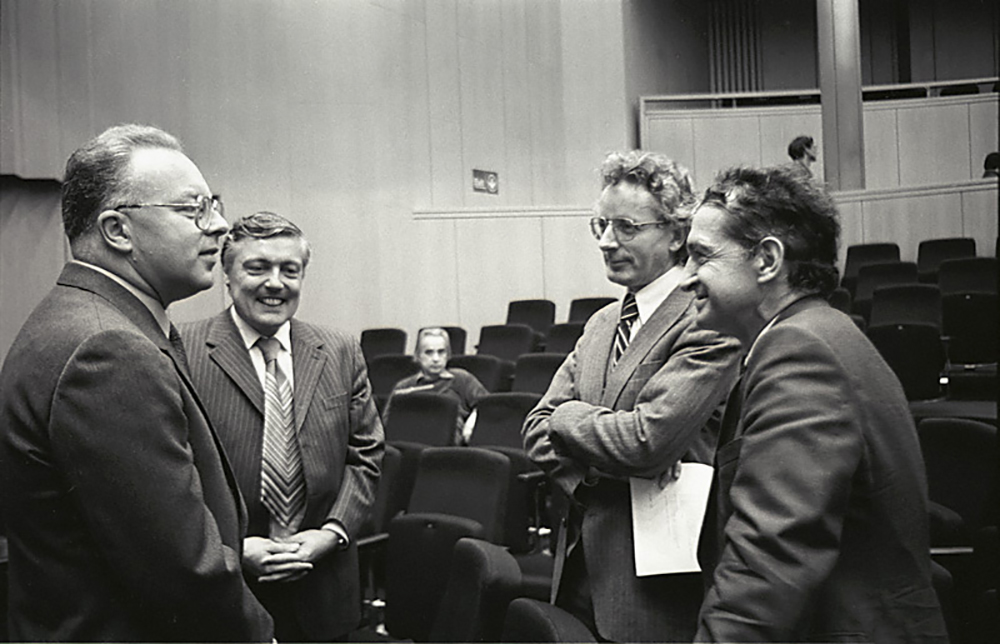 Rul Gunzenhäuser, Carl August Zehnder, a guest and Urs Hochstrasser attend the presentation of the new division IIIC in Audi Max.  Photo: ETH Library